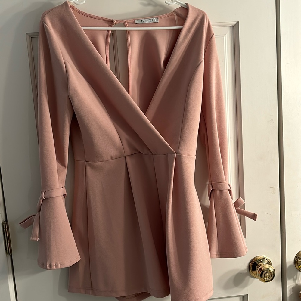 Blush romper with cutout back